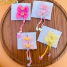 Sequin Tassel Heart Bow Clip Pair1